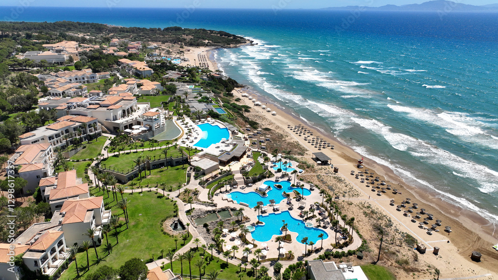Aerial drone photo of pool resort and vacation facilities in tropical exotic island bay Aerial drone photo of pool resort and vacation facilities in tropical exotic island bay