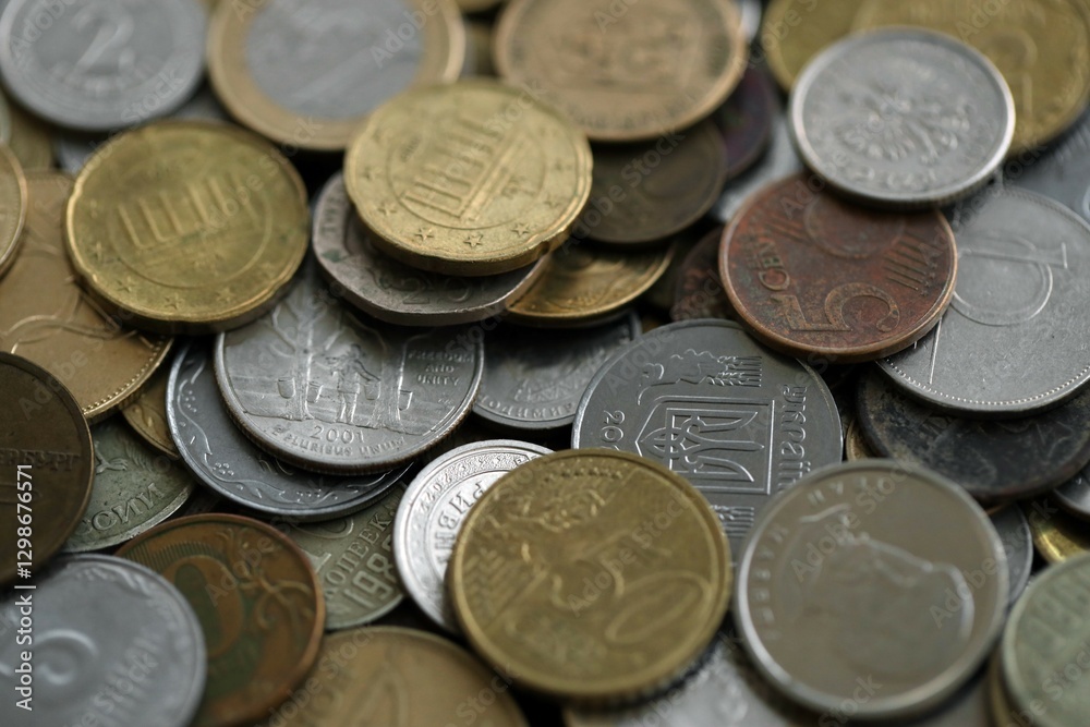 Big pile of different coins from various currencies and different countries around the world. Currency exchange Big pile of different coins from various currencies and different countries around the world. Currency exchange