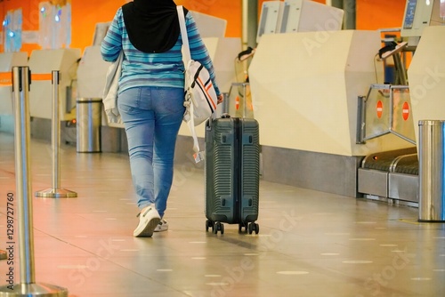 People walk in the terminal at Airport Check-In Counters With Passengers some one arrival some in their trip