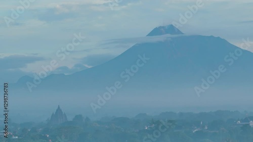 Jogja, Indonesia - February 5, 2025. 4k timelapse, morning atmosphere in Prambanan area with Sojiwan temple in the background, Sojiwan temple and Mount Merapi. photo