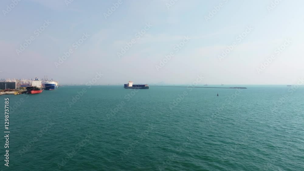 Drone view of cargo vessel departing port, Thailand. High quality 4k footage Drone view of cargo vessel departing port, Thailand. High quality 4k footage