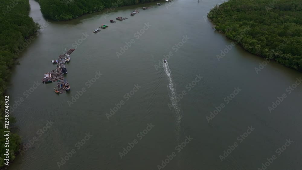 Aerial view of a boat cruising near Krabi old town, Thailand. High quality 4k footage Aerial view of a boat cruising near Krabi old town, Thailand. High quality 4k footage