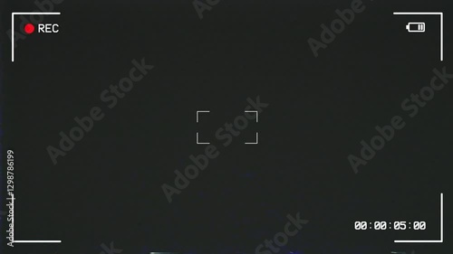 Camera screen recording with VHS glitch effect displaying information about battery status, playback, timer status. Camcorder interface with vintage noise dust effect. Videotape recording.