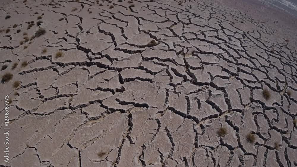 cracked earth texture caused by drought, illustrating the effects of climate change cracked earth texture caused by drought, illustrating the effects of climate change