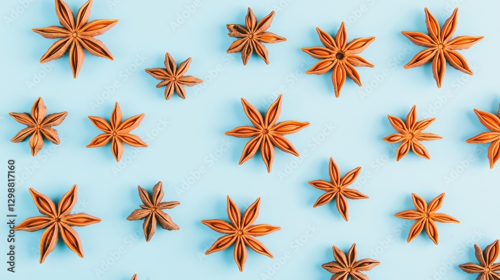 Star anise pattern on blue background: spice, aesthetic, culinary design trend Star anise pattern on blue background: spice, aesthetic, culinary design trend