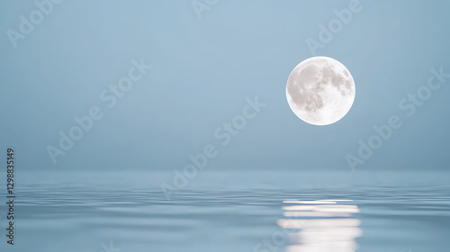 serene moon rising over calm ocean waters creates tranquil scene