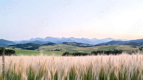 serene landscape featuring rolling hills and distant mountains at sunset