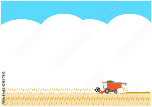 Combine harvester harvesting in a wheat field