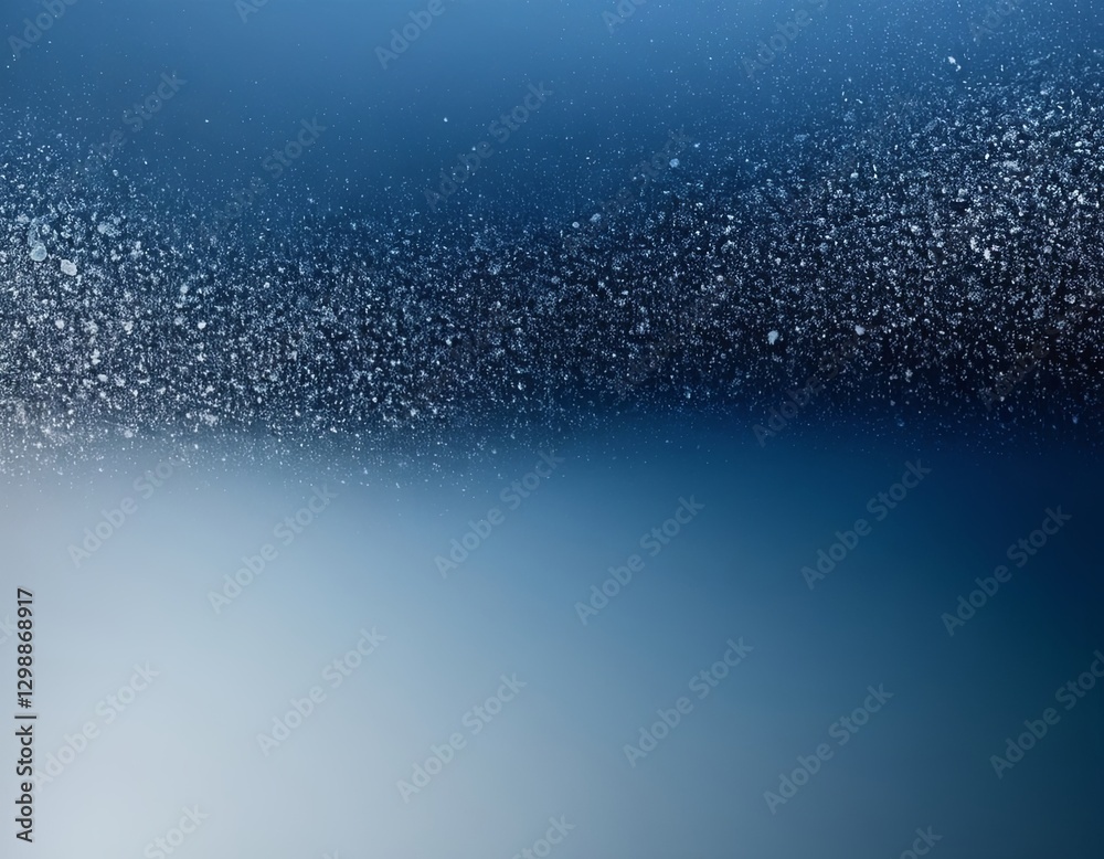 Obraz premium A serene blue gradient with soft particles creating a dreamy underwater effect.