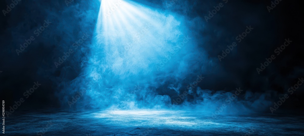 Obraz premium Ethereal Blue Light Illuminating Smoke on Dark Background Creating a Mystical Atmosphere Suitable for Creative Projects