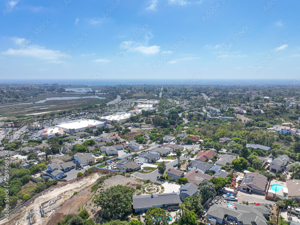 Aerial view of middle class houses in the valley of Oceanside town in San Diego, California. USA.