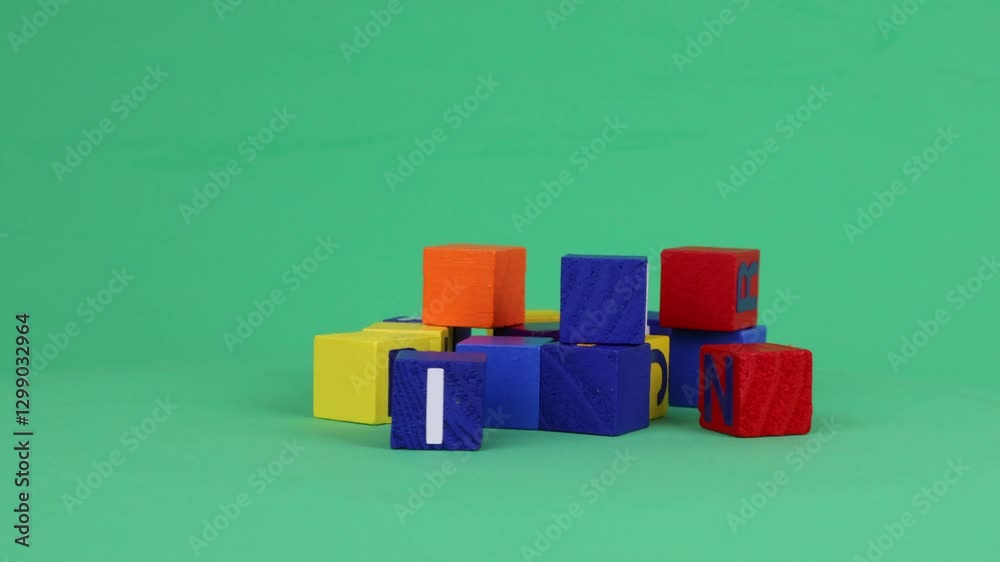 Pile of letters on wooden cubes rotating. Chroma Key, green screen for copy space. Pile of letters on wooden cubes rotating. Chroma Key, green screen for copy space.