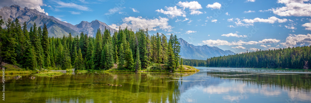 Panoramic view of Jonhson lake near Minnewanka lake in Banff National Park, Alberta web banner, Rocky Mountains, Canada