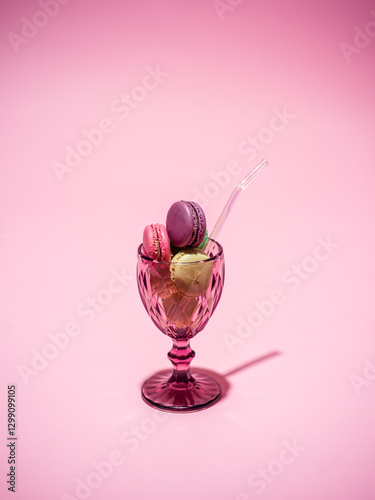 Colourful macaroons in a glass