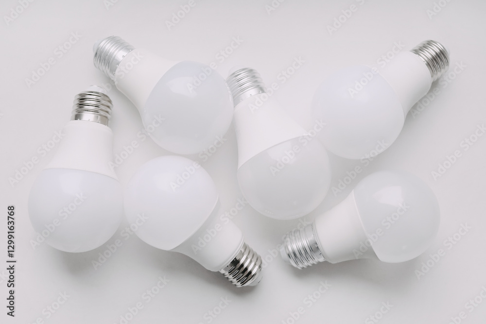 LED bulbs with E27 base on white background. Top view. Multiple LED Lights LED bulbs with E27 base on white background. Top view. Multiple LED Lights