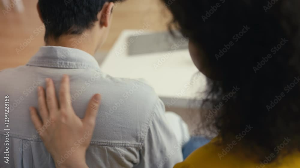 Mother comforting and supporting her depressed adolescent son, family strength Mother comforting and supporting her depressed adolescent son, family strength