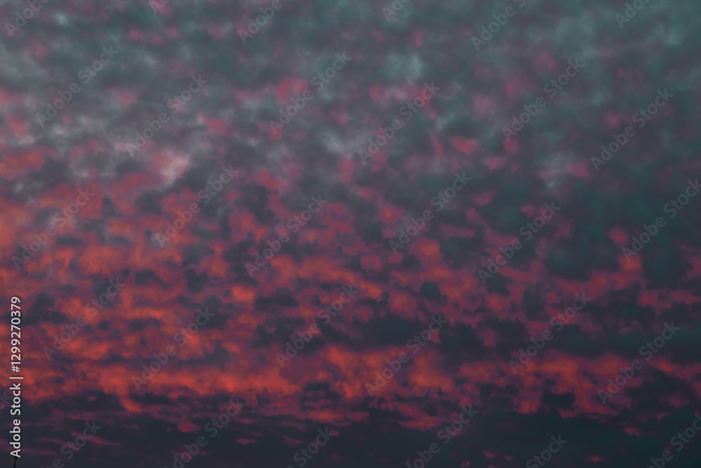 Serene Sunrise Sky with Vibrant Orange and Soft Blue Hues