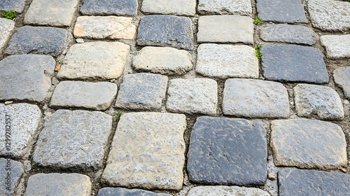 Historical gray cobblestone road background with a tileable pattern, great for urban and texture themes