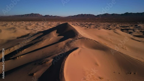 Large sand dune in the Chihuahua desert, Samalayuca with blue sky photo