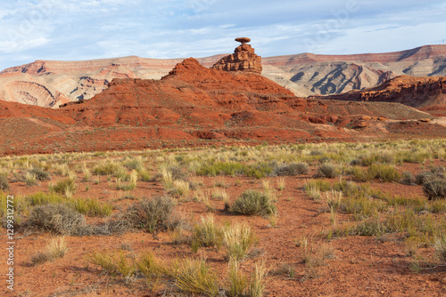 Fall landscape with the sombrero-shaped rock outcropping on the northeast edge of the town of Mexican Hat, Utah, USA