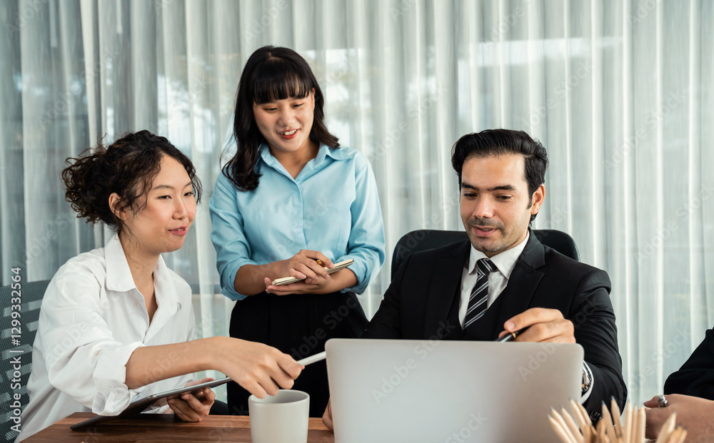 Diverse of business people from various ethnic group working in modern office environment. Productive and multi ethnic office workers engage in discussion for strategic business marketing. Habiliment Diverse of business people from various ethnic group working in modern office environment. Productive and multi ethnic office workers engage in discussion for strategic business marketing. Habiliment