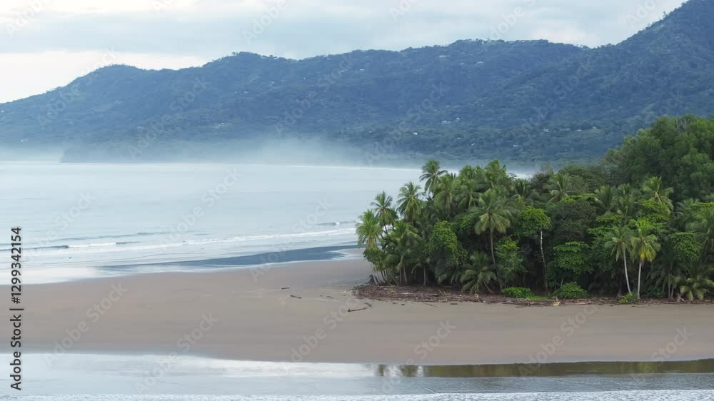 The aerial view above Uvita Beach highlights the stunning natural beauty of Marino Ballena National Park in Costa Rica, creating a breathtaking sight The aerial view above Uvita Beach highlights the stunning natural beauty of Marino Ballena National Park in Costa Rica, creating a breathtaking sight