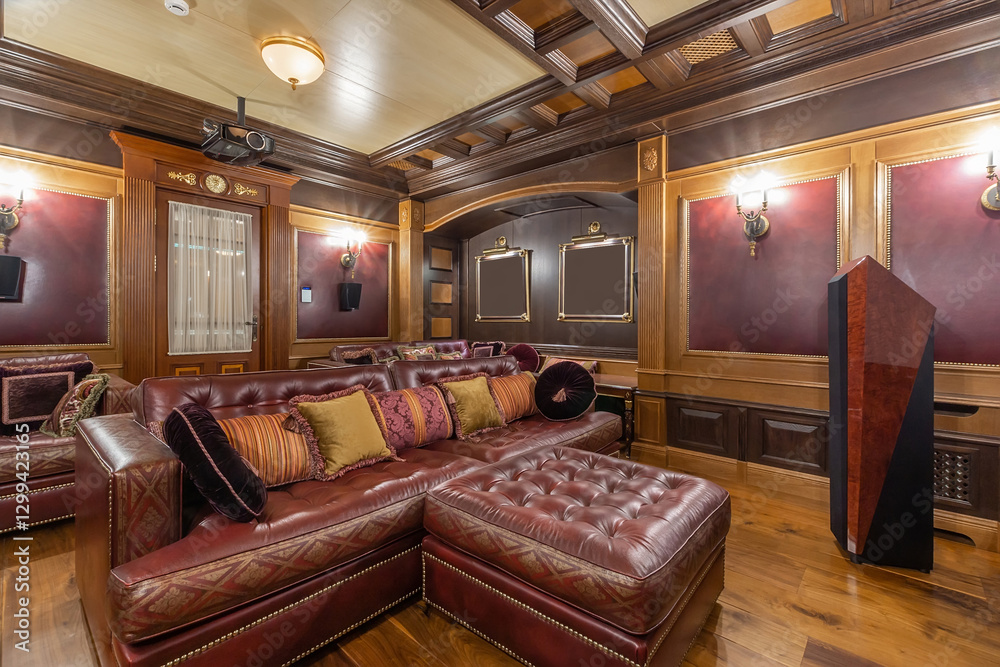 Fototapeta premium Luxury home theater interior design in classic style with lots of accessories. Comfortable leather sofas, wooden decor.