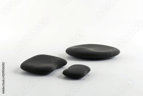 Modern black stone sculptures displayed