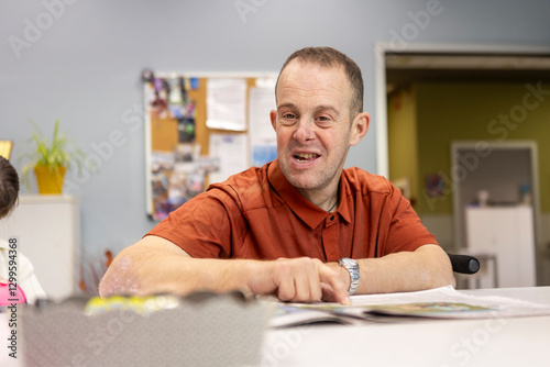 Smiling Man Engaging in Activities at Day Center photo