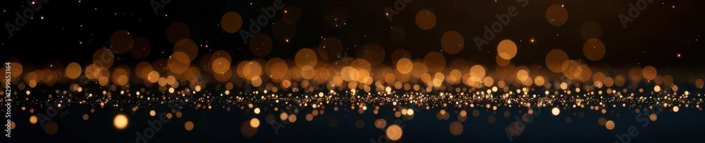 Obraz premium Dense, sparkling gold glitter scattered on black backdrop, decor, surface, shiny