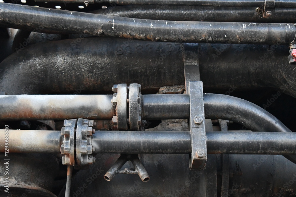 Closeup of steam powered locomotive. Steam pipes. Closeup of steam powered locomotive. Steam pipes.