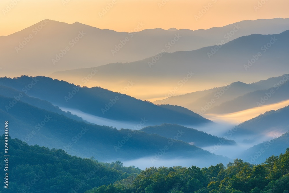 Obraz premium Serene Mountain Landscape with Mist at Sunrise in Soft Light