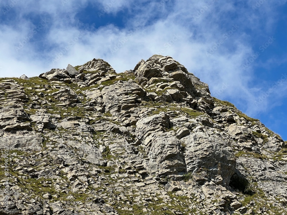 Rocks and stones above Lake Melchsee or Melch Lake and in the Uri Alps mountain massif, Melchtal - Canton of Obwalden, Switzerland (Kanton Obwald, Schweiz) Rocks and stones above Lake Melchsee or Melch Lake and in the Uri Alps mountain massif, Melchtal - Canton of Obwalden, Switzerland (Kanton Obwald, Schweiz)