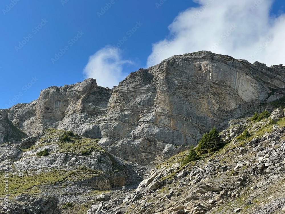 Fototapeta premium Rocks and stones above Lake Melchsee or Melch Lake and in the Uri Alps mountain massif, Melchtal - Canton of Obwalden, Switzerland (Kanton Obwald, Schweiz)