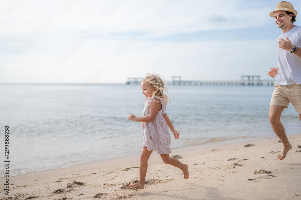 Child joyfully runs along the beach while adult follows her happily during a bright sunny day Child joyfully runs along the beach while adult follows her happily during a bright sunny day