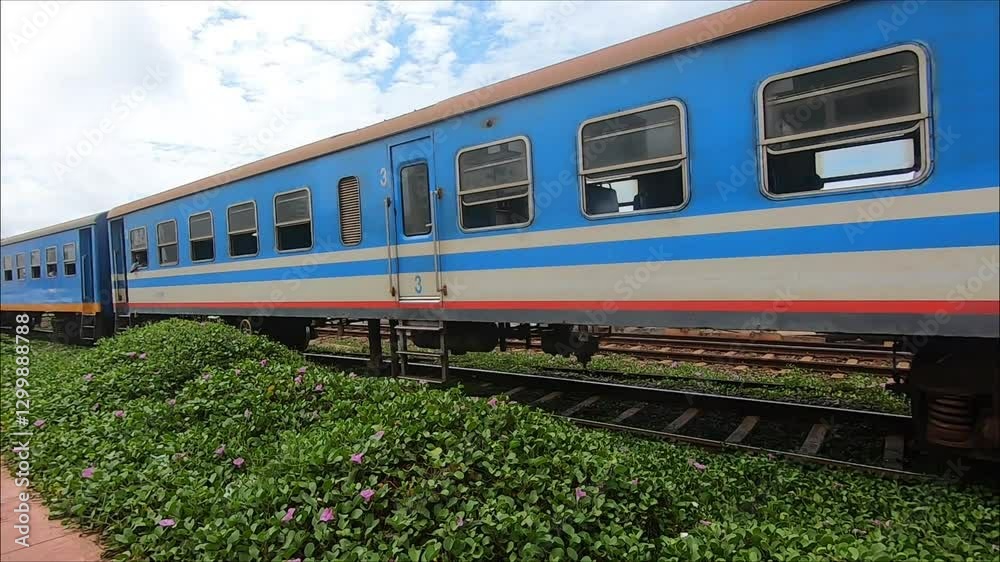 A Blue and White Train Traveling on Railways Colombo, Sri Lanka A Blue and White Train Traveling on Railways Colombo, Sri Lanka