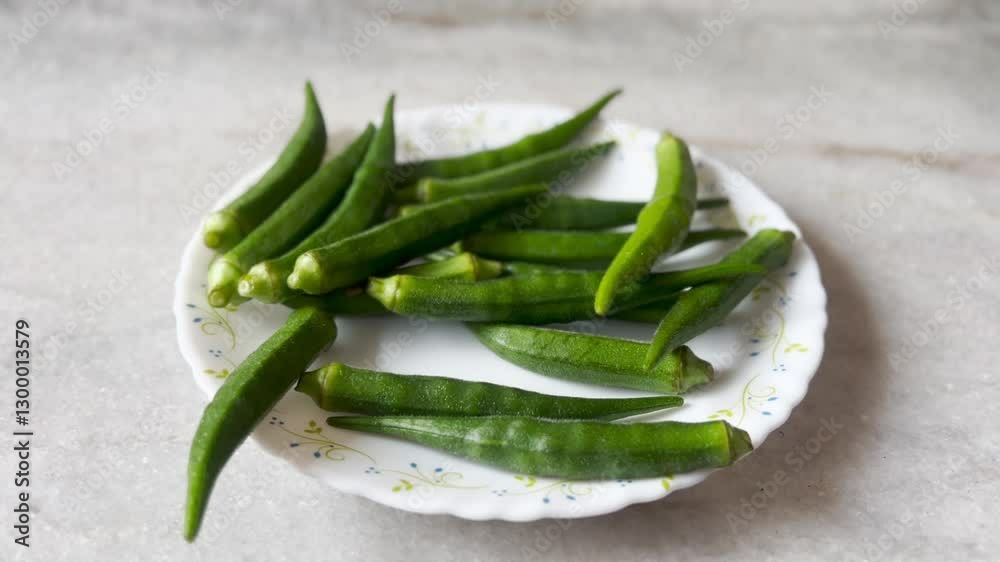 Super Green Lady Fingers Falling on the plate (okra) Super Green Lady Fingers Falling on the plate (okra)