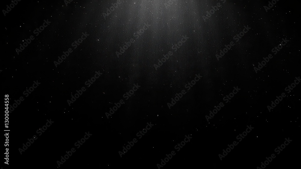 Obraz premium Black glitter glitter particles illuminated by light, creating a sparkling effect on a dark background