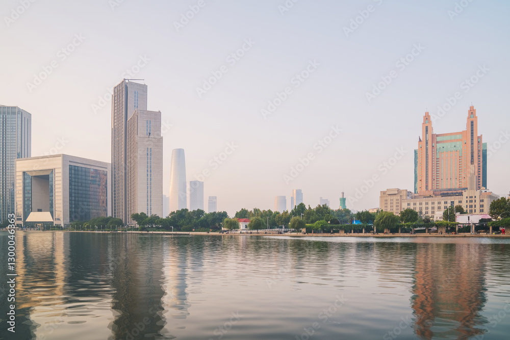 Obraz premium The urban architectural skyline, modern bridges, and Haihe River scenery of Tianjin, China on August 11, 2024 