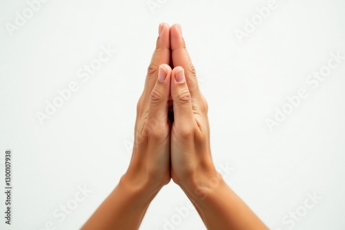 Praying hands on a white background. Symbol of prayer, spirituality, and hope. Ideal for religious, spiritual, or inspirational themes.