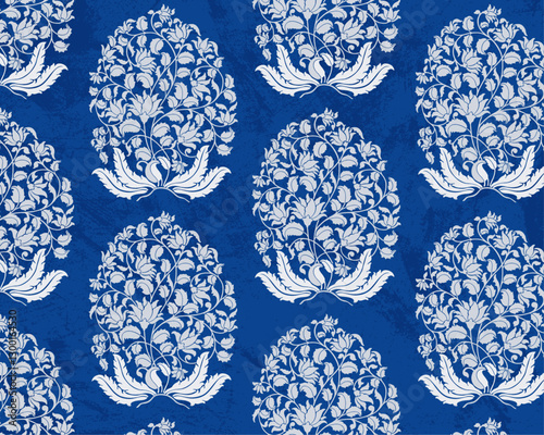 vector illustration of Mughal motif seamless pattern on blue texture backhground.