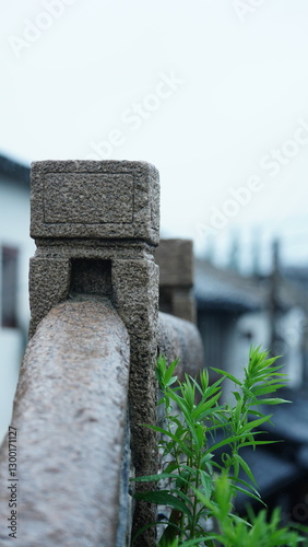 The old stone bridge column carved with some picture on it in China