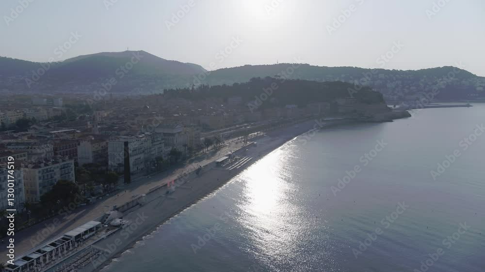 Aerial view in French Riviera with people on the beach in Nice during summer day
Long travelling drone shot in the french riviera during summer
Very high in altitude
Travelling drone shot with sun Aerial view in French Riviera with people on the beach in Nice during summer day
Long travelling drone shot in the french riviera during summer
Very high in altitude
Travelling drone shot with sun