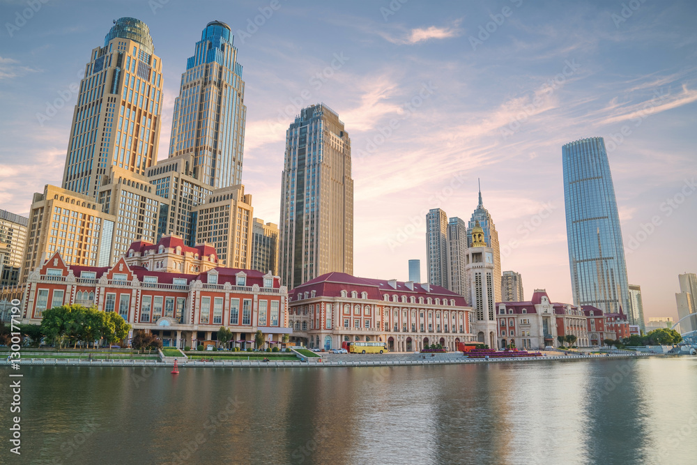Obraz premium The urban architectural skyline, modern bridges, and Haihe River scenery of Tianjin, China on August 11, 2024