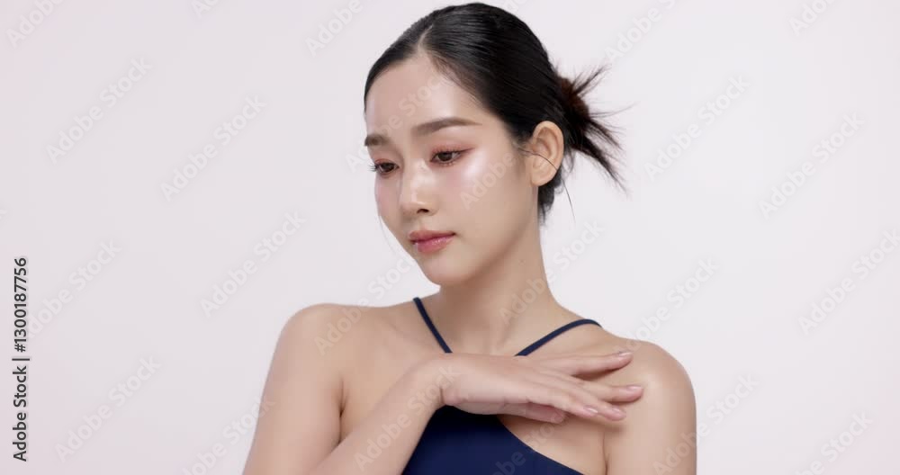 Slow motion of beautiful young Asian girl with k-beauty make up style on isolated white background for commercial beauty advertising. Slow motion of beautiful young Asian girl with k-beauty make up style on isolated white background for commercial beauty advertising.