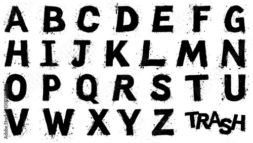 Alphabet en style grunge avec effet d’éclaboussure sur fond blanc