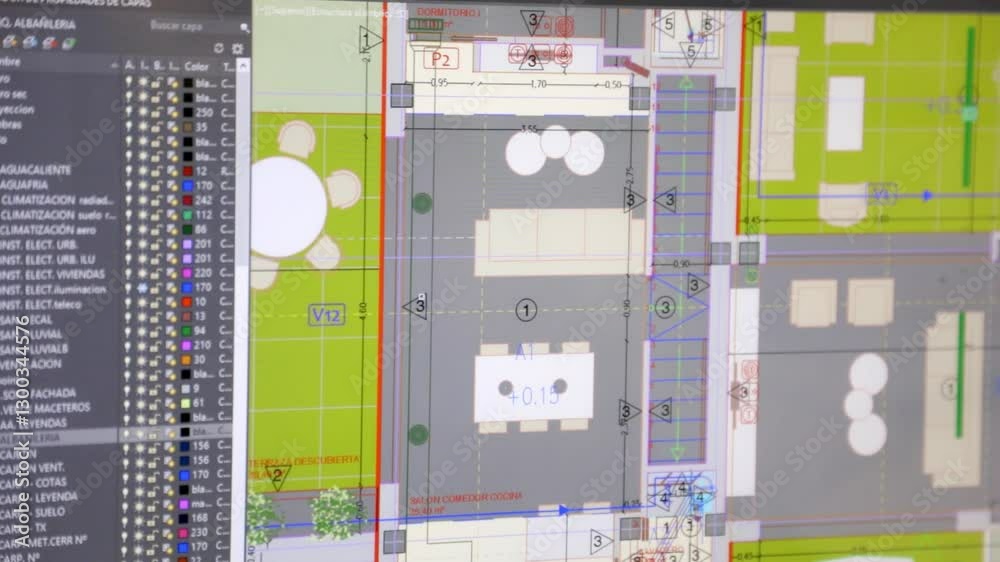 Detailed digital architectural plan displayed on a computer screen, showing structural elements, electrical layouts, and landscape design. The image highlights the use of CAD software in modern archit