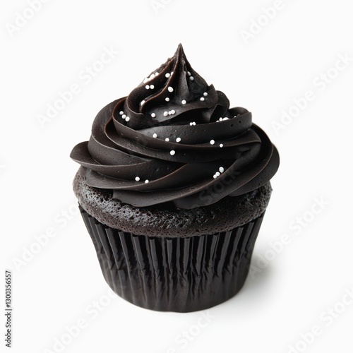 Black cupcake with black cream frosting isolated on white background.