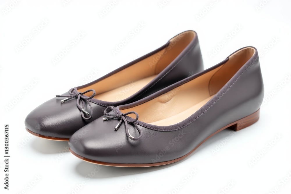 Elegant gray leather ballet flats with a delicate bow detail, isolated on a clean background, showcasing their timeless and sophisticated design for versatile wear. Elegant gray leather ballet flats with a delicate bow detail, isolated on a clean background, showcasing their timeless and sophisticated design for versatile wear.