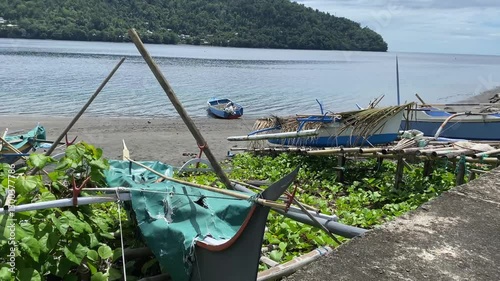 beach atmosphere with traditional boats from the Sangihe tribe, North Sulawesi province, Indonesia. pumb boat, February 8th 2024